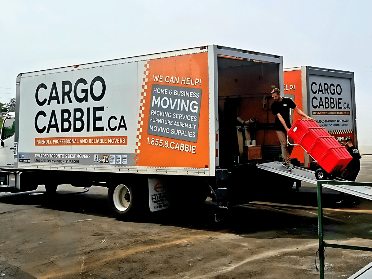 Residential moving professionals Residential moving professionals packing with moving bins