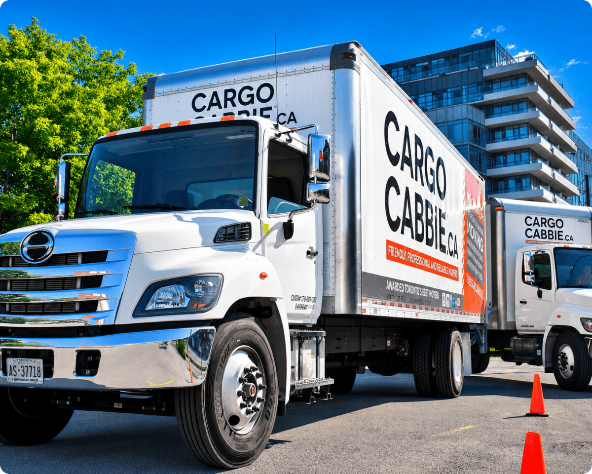 Condo movers Toronto - CARGO CABBIE trucks at a downtown condo building during a move