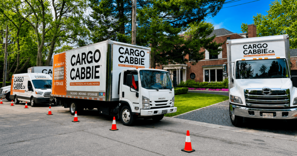 Best moving company in Toronto - CARGO CABBIE trucks outside a Toronto home